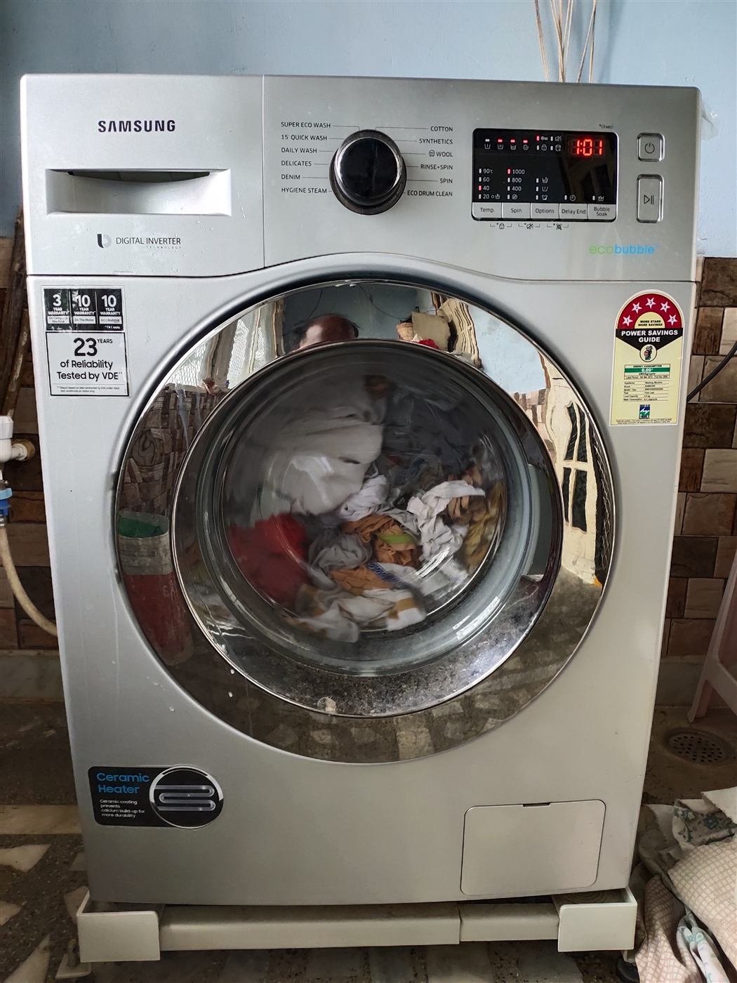 Samsung front-load washing machine installed and running at a Kamareddy home